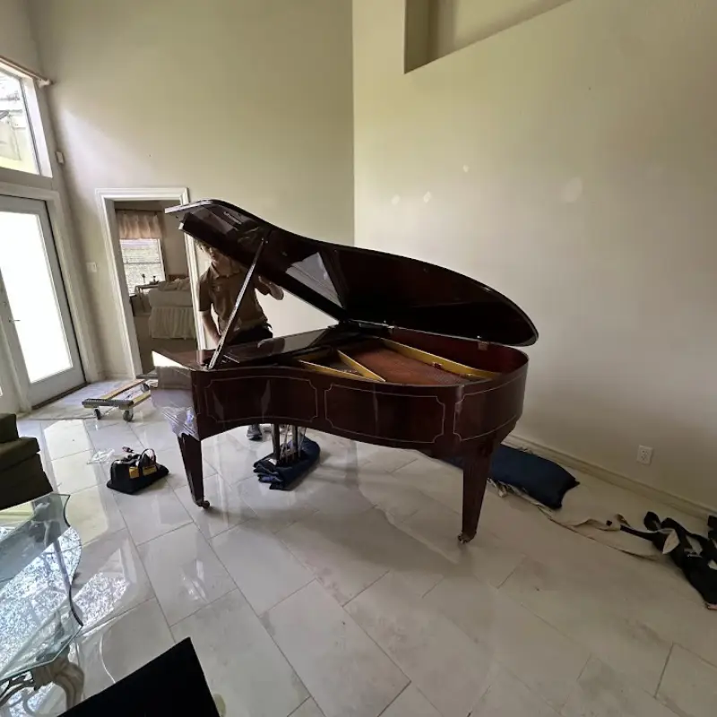Moving Antiques and Fine Art Safely in San Antonio 1 Grand piano prepared for a specialty move in San Antonio