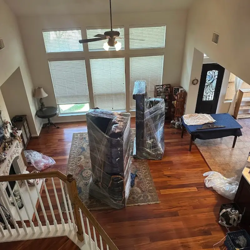 Weekend vs. Weekday Office Moves: Which Saves More Downtime in San Antonio? 1 Movers carrying furniture indoors during a San Antonio commercial move